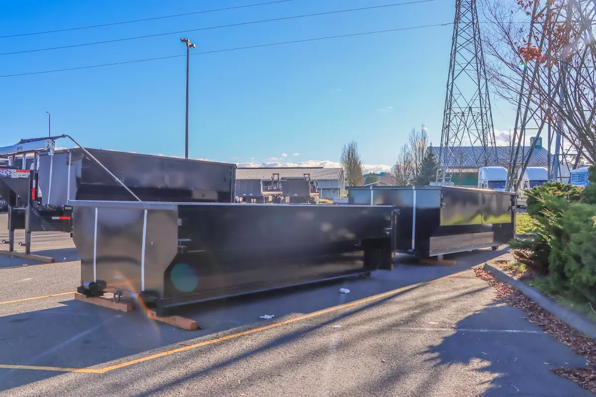 Roll-off dumpster ready for waste disposal at job site for Commercial Dumpster Rental in Hickory
